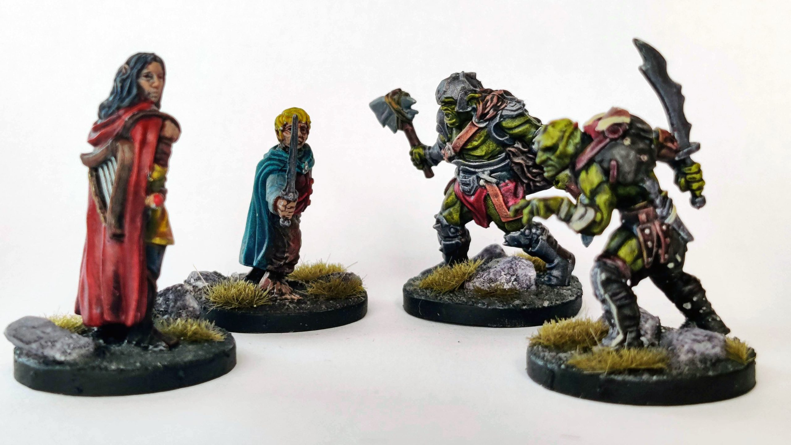Elena and Bilbo against a goblin and an orc, from Lord of the Rings: Journeys in Middle Earth. Painted with Speedpaints 2.0.